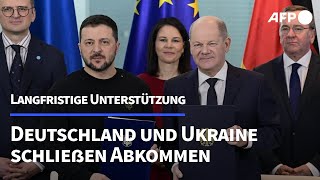 Deutschland und Ukraine schließen Sicherheitsvereinbarung  AFP [upl. by Ines]