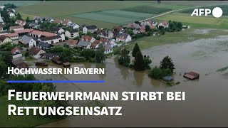 Hochwasser Feuerwehrmann stirbt bei Rettungseinsatz in Bayern  AFP [upl. by Ahseyn]