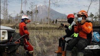 Volunteers face tragic mission in search of Mt Semeru volcano victims [upl. by Kinelski72]