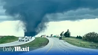 Terrifying videos show tornado sweeping across Nebraska town [upl. by Ahsuatan426]