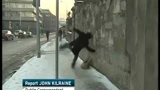 Falling Guy on Icy Snow Footpath RTE News Ireland  Stuntman [upl. by Joslyn305]