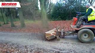 Sweeper on a Kubota rideon mower [upl. by Ecinnej]