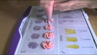 Cake Decorating Piping Techniques How to Make Drop Flowers [upl. by Aivonas]