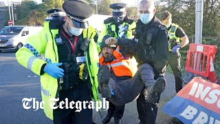 Police stop Insulate Britain from blocking M25 [upl. by Ramilahs]