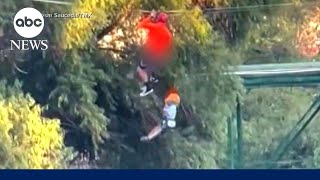 Child safe after dangling 40 feet in the air after his harness failed while ziplining l GMA [upl. by Ataynek131]