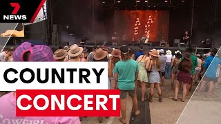 Music fans rock on at Australias biggest country festival  7 News Australia [upl. by Isnyl]