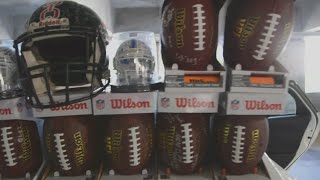 Former high school football player gives memorabilia to kids battling cancer [upl. by Adalard]