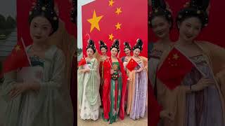 Some costume lovers in Luoyang Henan Province wore Hanfu and took photos with the national flag [upl. by Stauder]