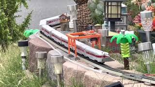 TYCO Streamliner cars klickety klack￼ around the garden railroad at high speeds with Athearn SP F7 [upl. by Dunning]