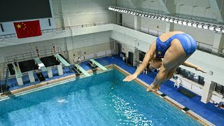 Chinas Olympic diving success inspires at Beijing pool [upl. by Ruosnam]