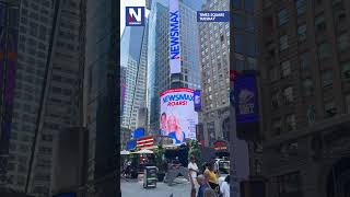 SEE IT NEWSMAX lights up Times Square in New York City [upl. by Norvin]