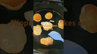 Flipping pancakes on cast iron pan kodiak cakes [upl. by Ocirred789]