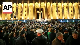 Tens of thousands rally in Georgia to denounce election they say was rigged  AP Explains [upl. by Stanway429]