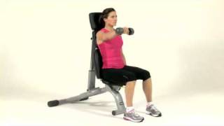 Weightplancom exercise  Dumbbell Seated Front Raise  Shoulders Female [upl. by Lindholm762]