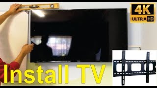 How to install a TV onto a wall with a bracket and lay trunking Step by step [upl. by Uta94]