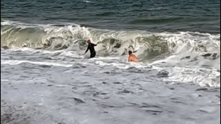 Hardy swimmers coming ashore in stormy October conditions  South Devon coast [upl. by Chapnick676]