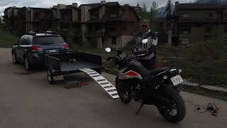 How to Load a Motorcycle onto a Ramp Trailer [upl. by Ellehcrad]