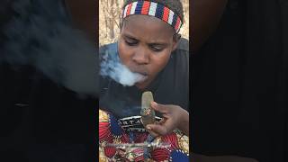 Hadzabe woman smoking a cigarettesmoke [upl. by Narra]