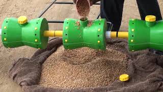 KSNM Rice Seeder  Filling the drum with seeds [upl. by Leuqer129]