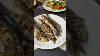 Sardinhas Portuguesas  some delicious sardines in Portugal Delicious [upl. by Elitnahc912]