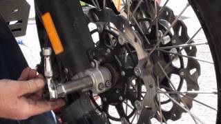 BMW F800GS Maintenance  Remove and install front wheel [upl. by Anaugahs]