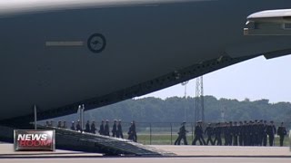 First MH17 bodies arrive in Netherlands [upl. by Orsa]