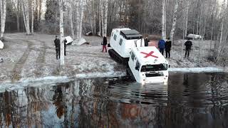 Amphibious BV206 Hagglund swimming in ice cold water [upl. by Atterg650]