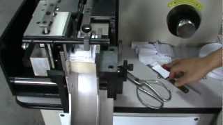 label fabric cutting and folding machine [upl. by Noiwtna]