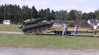 British Alvis CVRT Sabre light tank getting loaded up on a flatbed [upl. by Shields]