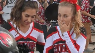 Football players kind gesture to cheerleader goes viral [upl. by Berny]