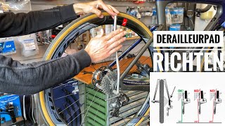 Wat te doen bij een scheef derailleurpadje en zo moet je een verbogen DERAILLEUR PAD richten [upl. by Annaeed]