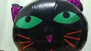 Mylar balloon halloween cat Inflating and popping [upl. by Neirda]