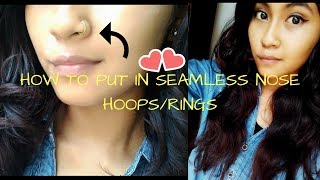 HOW TO PUT IN SEAMLESS NOSE HOOPRINGS [upl. by Legnalos]