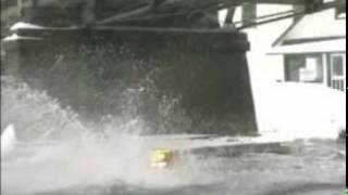 Snowmobile Hits bridge while watercrossing [upl. by Ahsatak]