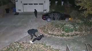 Surveillance video captures robbery outside Chicago home [upl. by Marc]