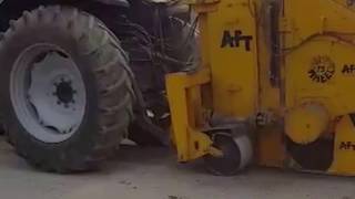 AFT Wizz Wheel 75 trencher laying cables along the roadside in Algeria [upl. by Mazlack]