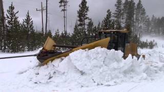 Plowing snow from roads in the spring in Yellowstone National Park [upl. by Marilou]