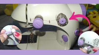 HOW TO REMOVE THE BOBBIN SPINDLEHOLDER THE PURPLEVIÓLET IN MINI SEWING MACHINE minisewingmachine [upl. by Lotte909]