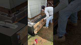 Stripping wet concrete curb in preparation for concretefinishing modern smooth concrete finish [upl. by Lahsram]