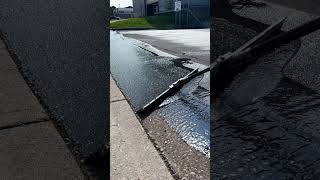 Asphalt sealcoating with a brush oddlysatisfying shorts [upl. by Reyotal]