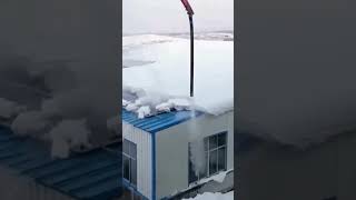 Snow clearing process on rooftop [upl. by Sowell681]