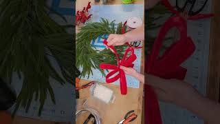 How to make a budget friendly Christmas pine wreath using a dollar tree base pine amp berries [upl. by Rona310]