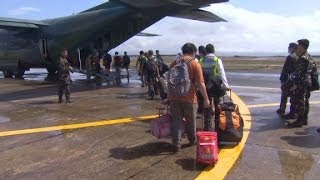 Typhoon Haiyan survivors seek help at airport [upl. by Lyret812]