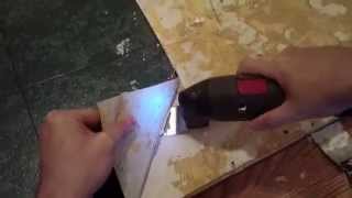 How To Remove Linoleum Or Vinyl Flooring From Wooden Floor Using An Oscillating Multi Tool [upl. by Fihsak]