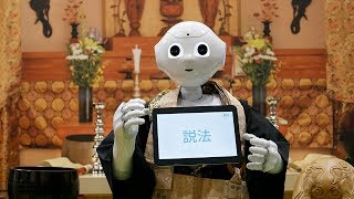 Robot priest programmed to conduct funeral ceremonies at Life Ending Industry EXPO 2017 in Japan [upl. by Refinaj]