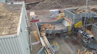 Rotary Debarker  24m Long Logs Being Discharged From 75m Long Side Discharge Debarker [upl. by Geordie]