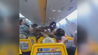 Shocking moment brawl breaks out over window seat on Ryanair flight [upl. by Ennire]