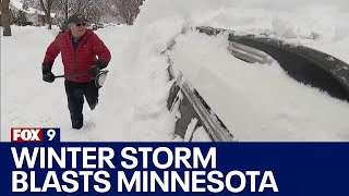 Minnesotans trudge through another blast of winter weather [upl. by Akihsay]