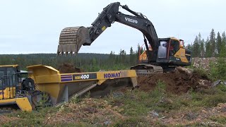 Volvo EC300EL  Loading a Komatsu HM400 with overburden in a quarry [upl. by Yoccm]