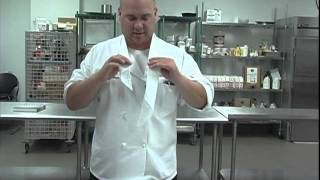 The Chefs Academy How to tie a neckerchief [upl. by Auhesoj]